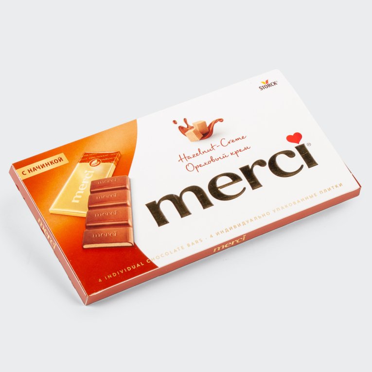 Молочный шоколад с ореховой начинкой merci