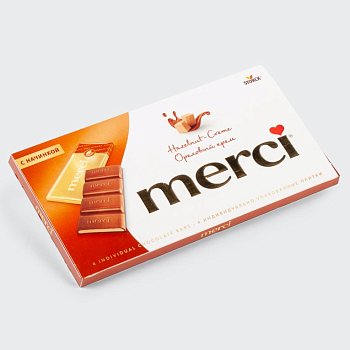 Молочный шоколад с ореховой начинкой merci